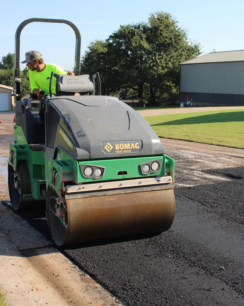 roller compacting asphalt on a street in Edmonds, OK